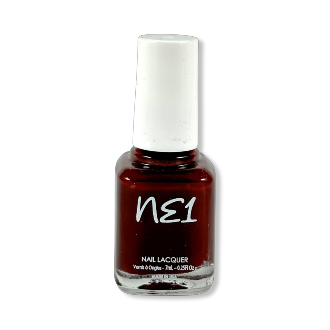 Bottle of Ravishing Rose, a dark red nail polish