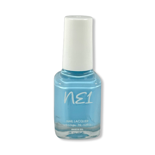 Bottle of Vamos a la Playa, a light blue nail polish